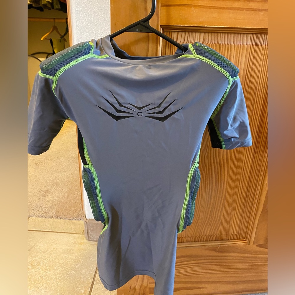 Youth Football Shirt With Pads - Size Medium. Only worn twice, gently used